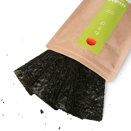 Nori snacks popping out of a bag of the product