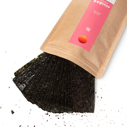 Nori seaweed snacks popping out of a bag of the product