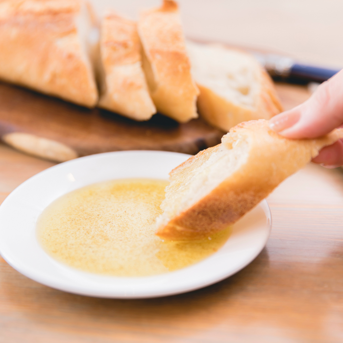 Dipping a bread to Pure Rice Bran Oil