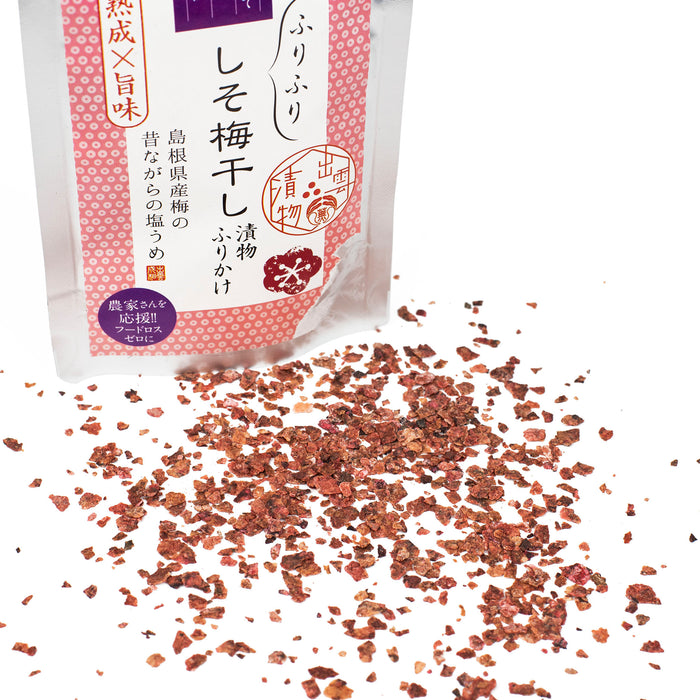 Scattered furikake next to a package of the product