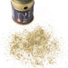 Scattered sansho pepper powder next to package bottle of the product