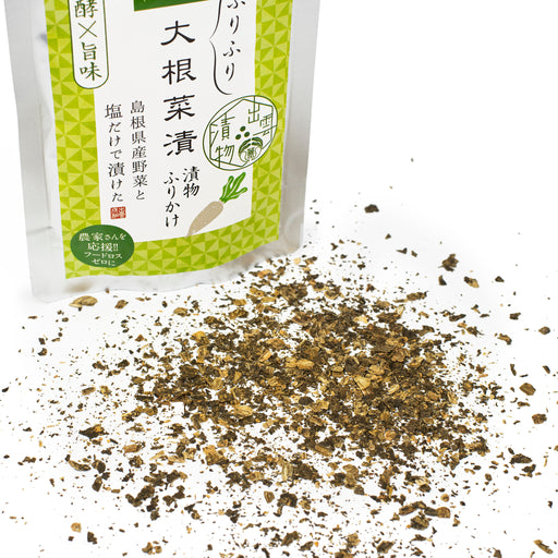 Scattered furikake next to a package of the product