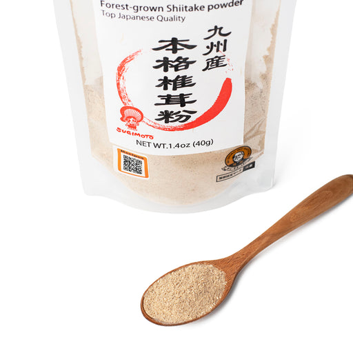 A spoon of shiitake mushroom powder next to package of the product