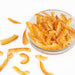 Dry candied Iyokan citrus peels in a small bowl