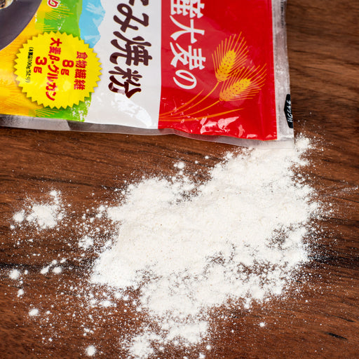 Okonomiyaki flour popping out of package bag of the product