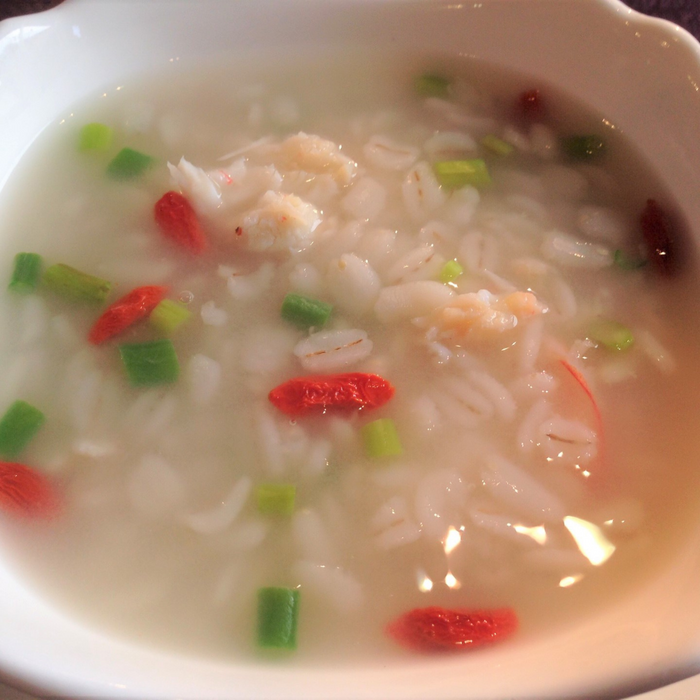 A bowl of congee with pearl barley