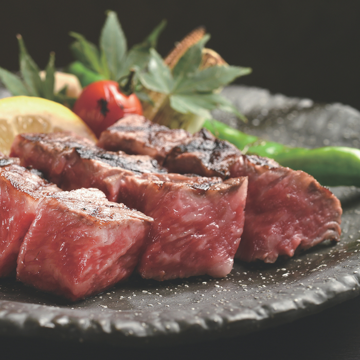 A plate of beef steak sprinkled with wasabi salt
