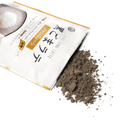 Black sesame latte mix popping from package