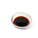 A small bowl of the organic smoked soy sauce