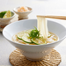 A bowl of kishimen noodles with bonito dashi soup