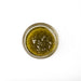 Overhead shot of small bowl of wasabi pesto sauce