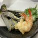 A plate of tempura veggies and shrimps