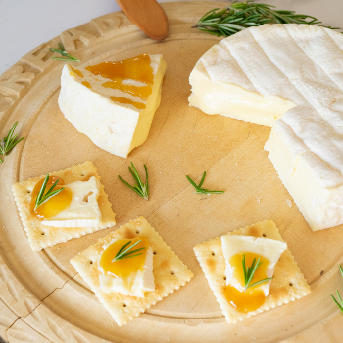 Cheese and crackers topped with organic yuzu spread