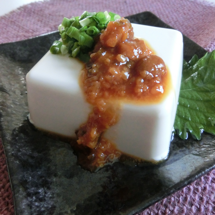 A plate of tofu topped with moromi