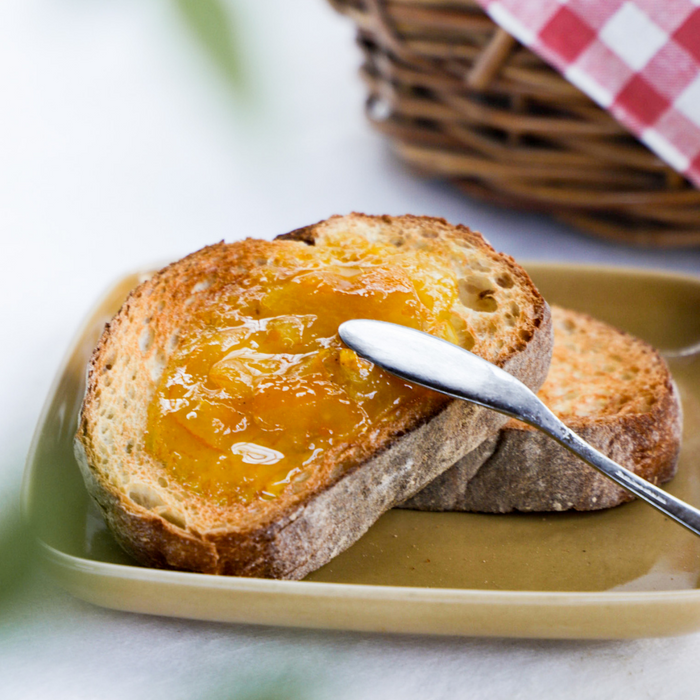 Bread topped with organic yuzu marmalade