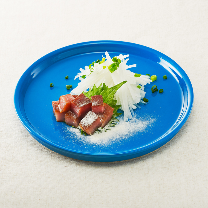 A plate of thick bacons topped with rice koji powder