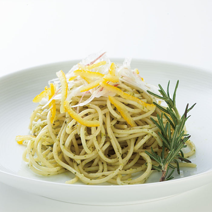 A plate of spaghetti with wasabi olive oil sauce
